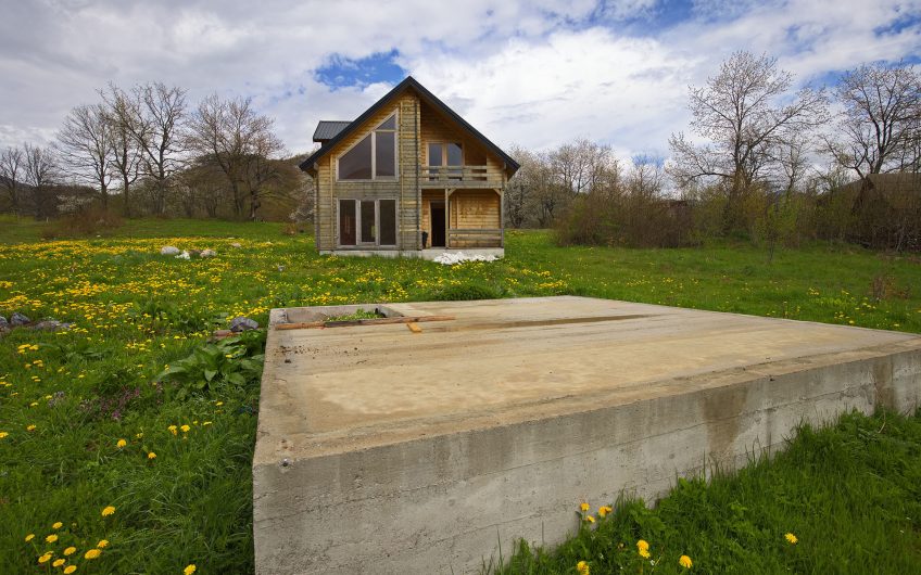 For Sale – Spacious Plot with a Built Wooden House and Full Infrastructure, Kolašin