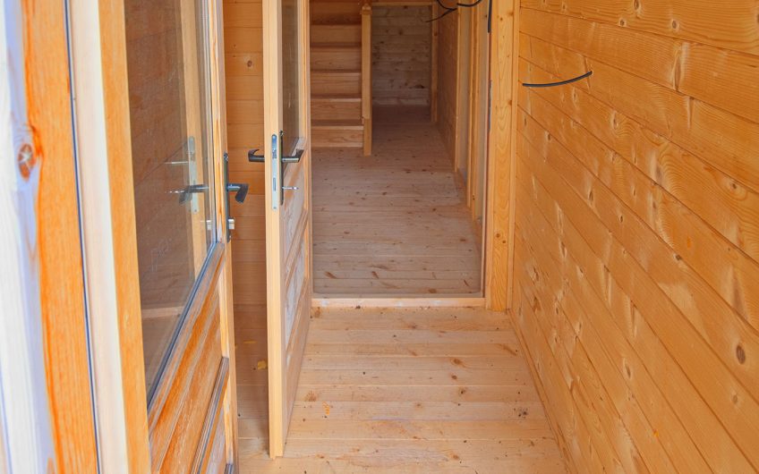 For Sale – Spacious Plot with a Built Wooden House and Full Infrastructure, Kolašin